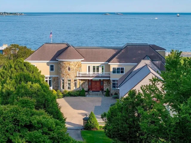 a aerial view of a house with a yard