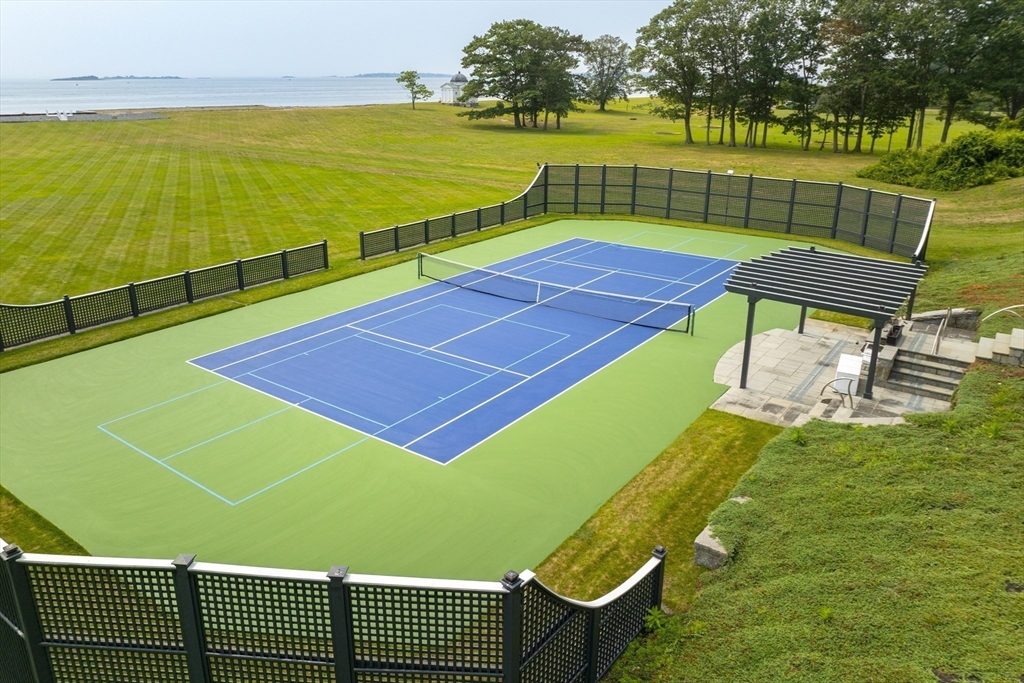 76 Paine Avenue Beverly, MA 01965 - Photo 7 of 41 a view of an outdoor space and tennis court