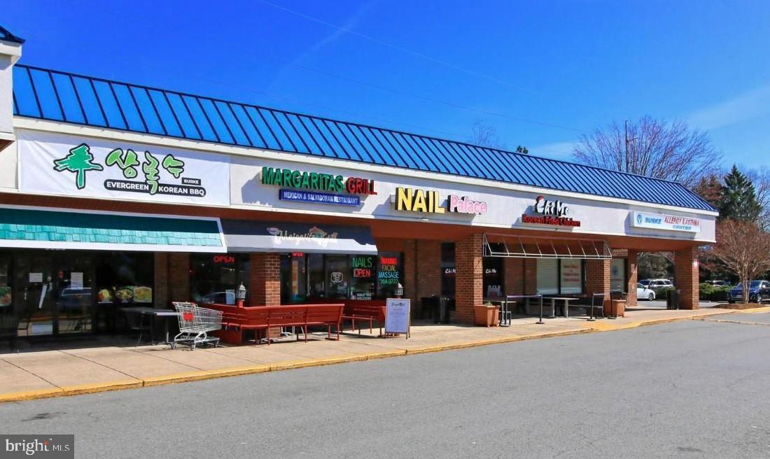 5833 Cove Landing Road, Unit 304 Burke, VA 22015 - Photo 32 of 34 a view of street with shops