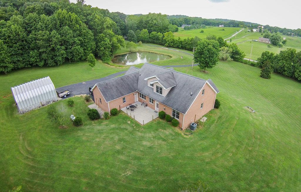 2727 Henry Gower Road Pleasant View, TN 37146 - Photo 20 of 30 an aerial view of a house with garden
