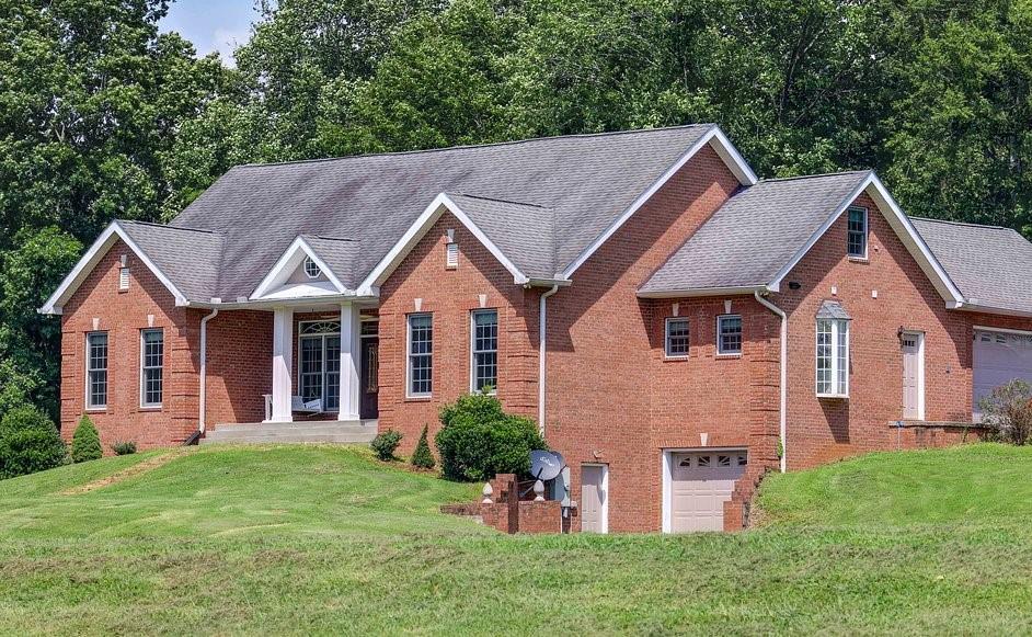 2727 Henry Gower Road Pleasant View, TN 37146 - Photo 2 of 30 a aerial view of a house with a yard potted plants