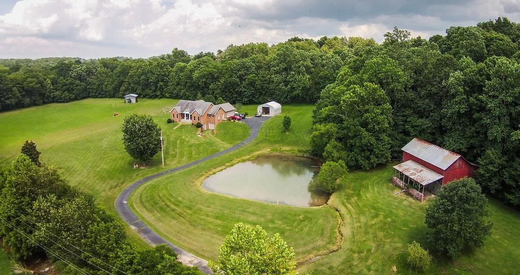 2727 Henry Gower Road Pleasant View, TN 37146 - Photo 24 of 30 a view of a golf course with a swimming pool