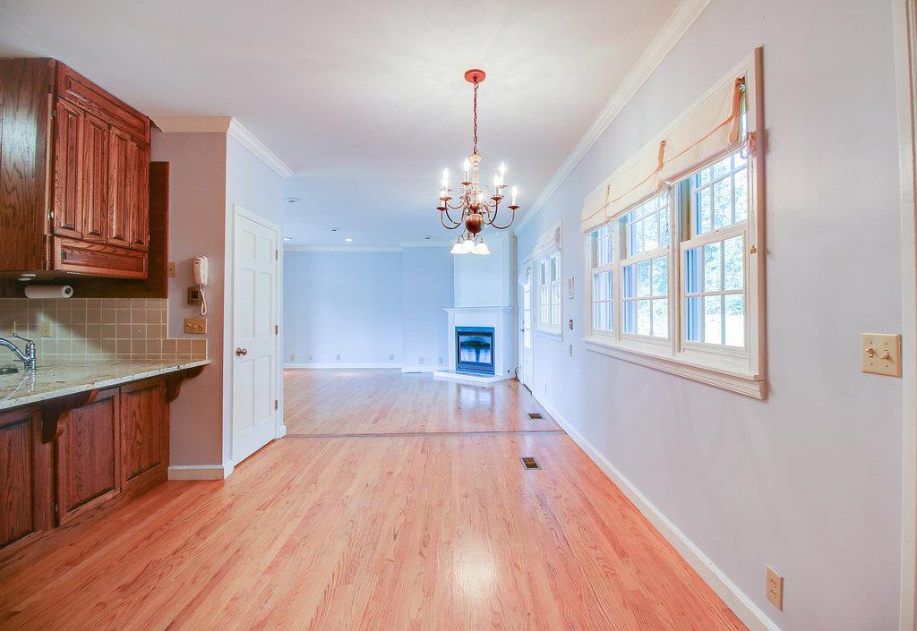 2727 Henry Gower Road Pleasant View, TN 37146 - Photo 28 of 30 a view of a kitchen with wooden floor and a kitchen