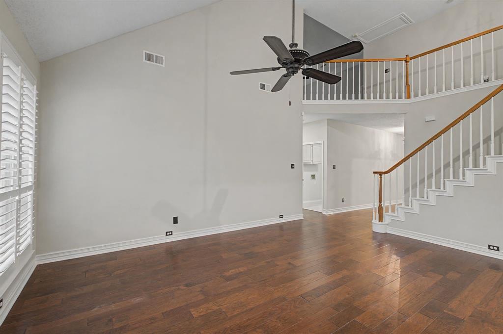 2705 Wind Ridge McKinney, TX 75072 - Photo 14 of 40 a view of room with hardwood floor and window