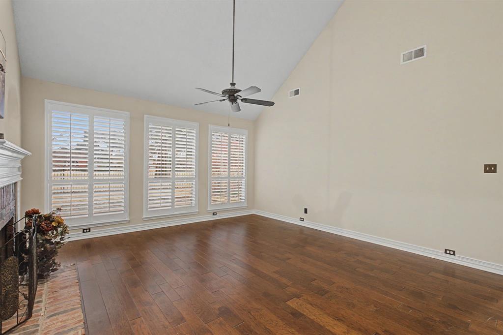 2705 Wind Ridge McKinney, TX 75072 - Photo 15 of 40 wooden floor in an empty room with a window