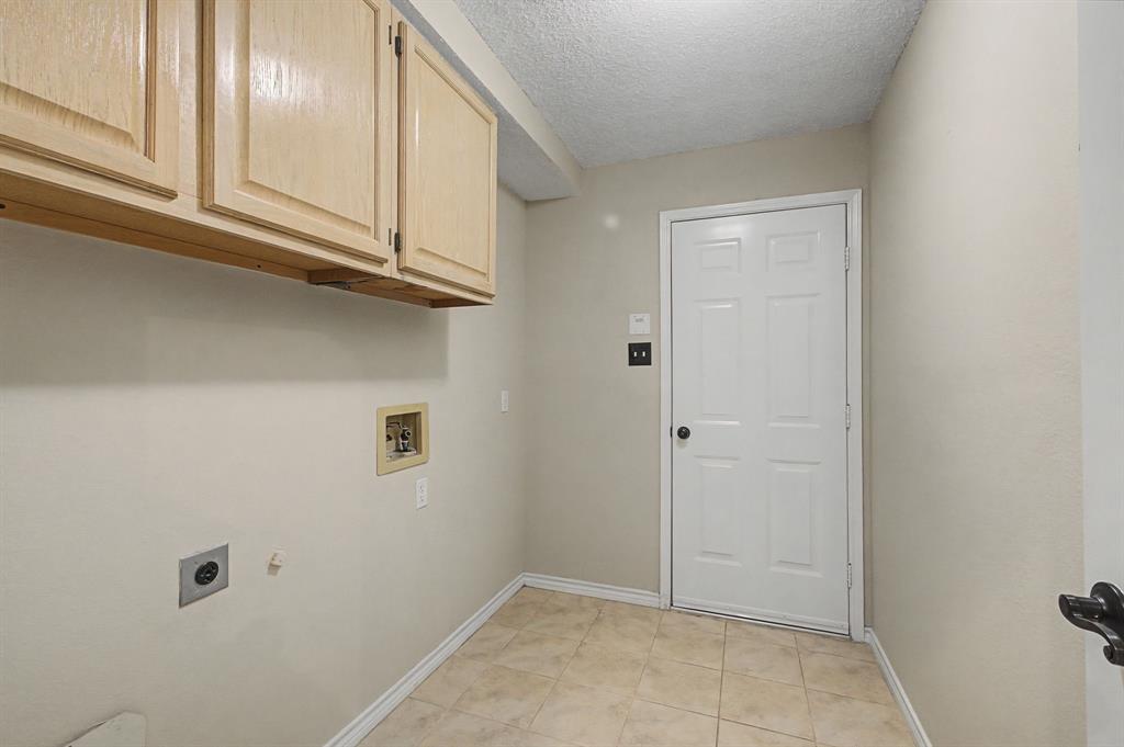 2705 Wind Ridge McKinney, TX 75072 - Photo 24 of 40 a view of cabinets