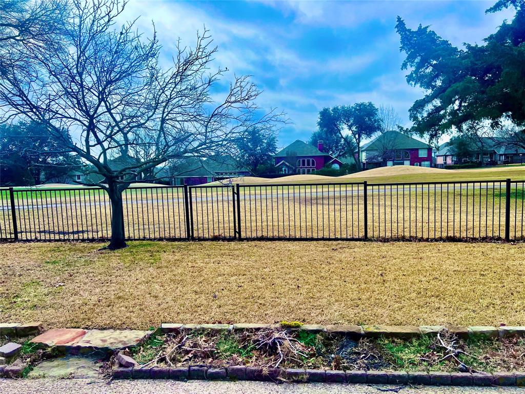 2705 Wind Ridge McKinney, TX 75072 - Photo 39 of 40 a view of a garden with wooden fence