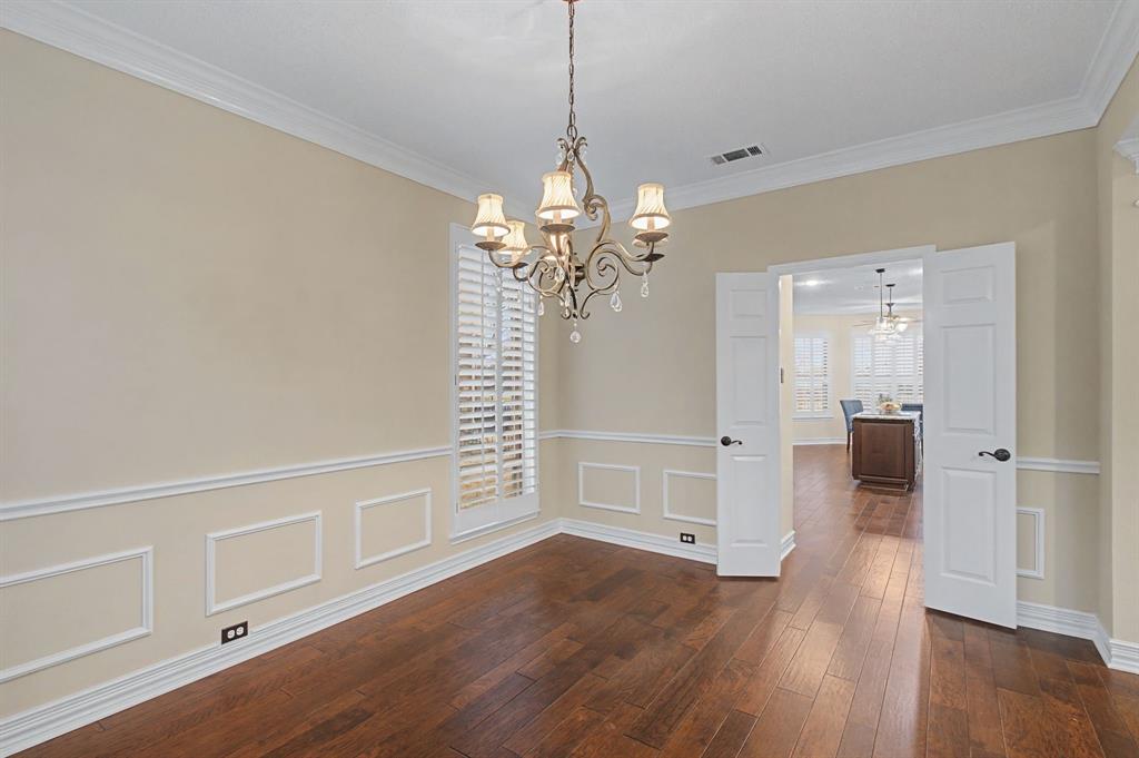 2705 Wind Ridge McKinney, TX 75072 - Photo 9 of 40 a view of a livingroom with wooden floor