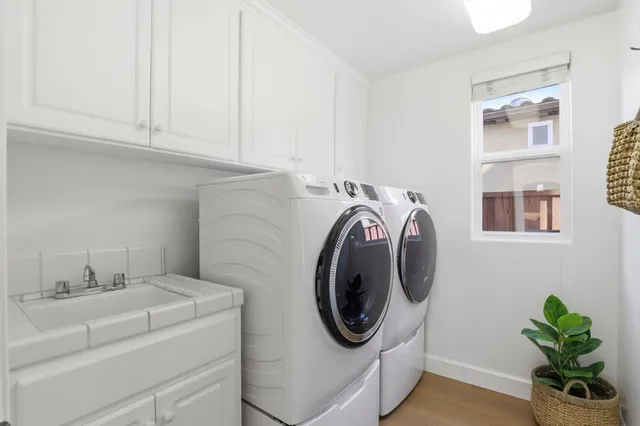a utility room with dryer and washer