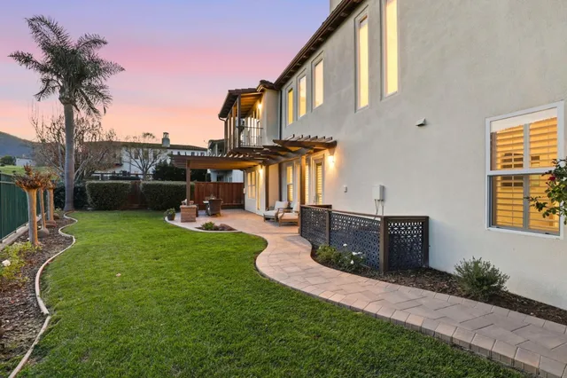 a view of a garden with a lake view