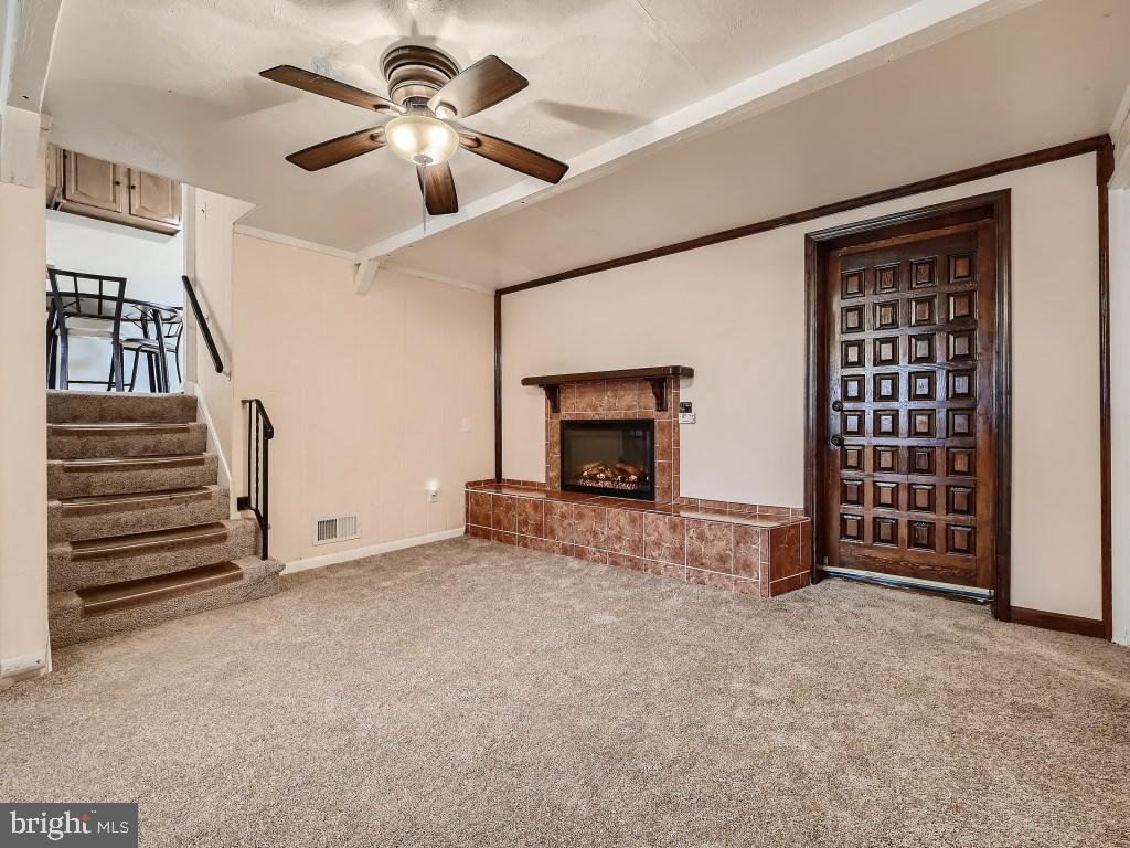 1004 Lakemont Road Baltimore, MD 21228 - Photo 22 of 32 Lower Level 1 with Electric Fireplace