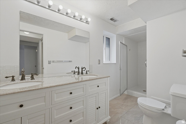 392 Perrine Drive Midvale, UT 84047 - Photo 14 of 37 lovely updated main bath.