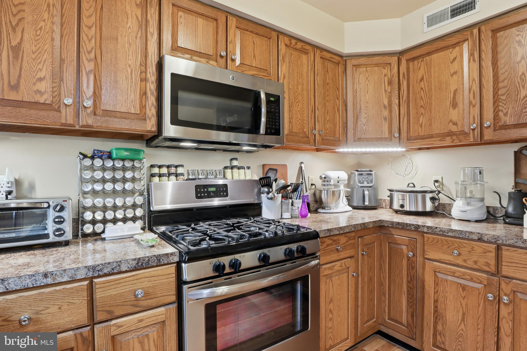 160 Greenleaf Road York, PA 17406 - Photo 11 of 46 Warm wood tones in a cozy kitchen space.