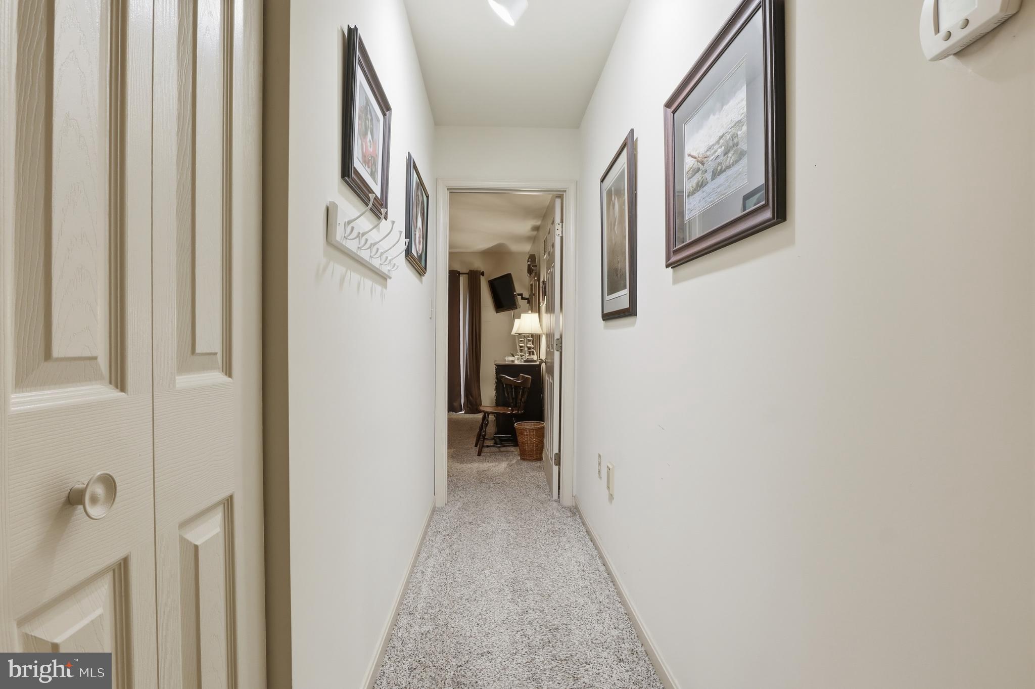 160 Greenleaf Road York, PA 17406 - Photo 13 of 46 Inviting hallway adorned with framed art.