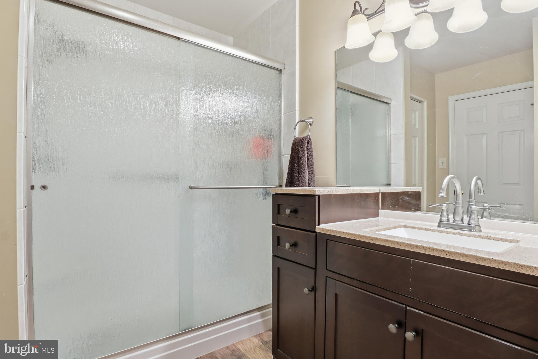 160 Greenleaf Road York, PA 17406 - Photo 18 of 46 Modern bathroom with sleek glass shower.