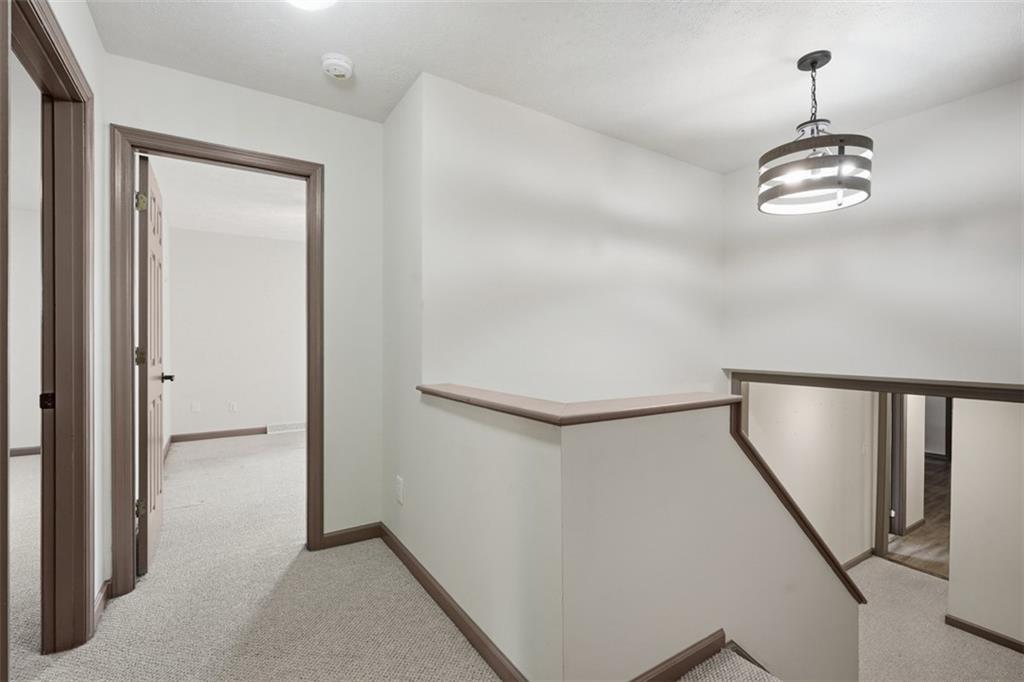 8517 Wittmer Road Pittsburgh, PA 15237 - Photo 22 of 46 a view of empty room with wooden floor and ceiling fan