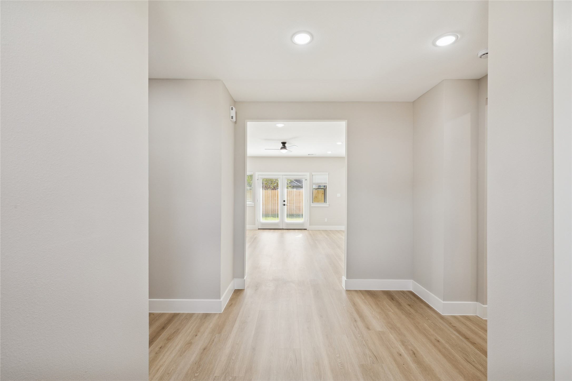 2602 Martinas Ct Spring Spring, TX 77388 - Photo 3 of 24 a view of empty room with wooden floor and fan