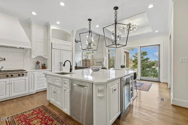 a bathroom with a granite countertop sink mirror and a bathtub