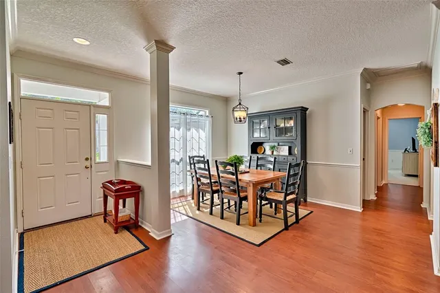 a livingroom with furniture and wooden floor