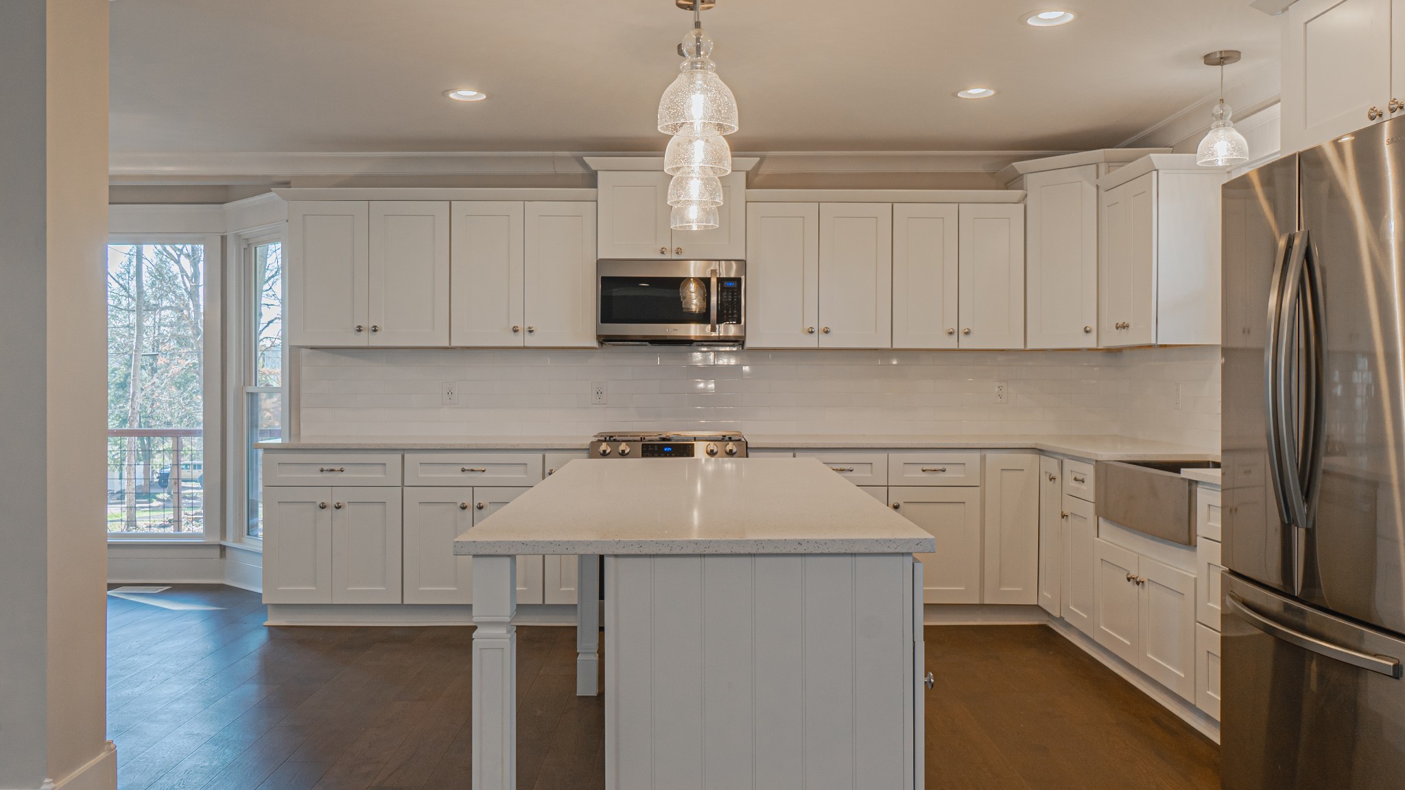 3445 Forest Park Road Springfield, TN 37172 - Photo 8 of 46 a kitchen with stainless steel appliances white cabinets and a refrigerator