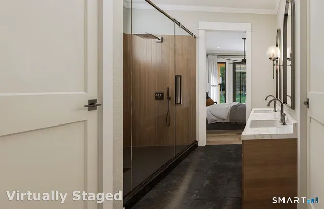 a view of a bathroom from a hallway