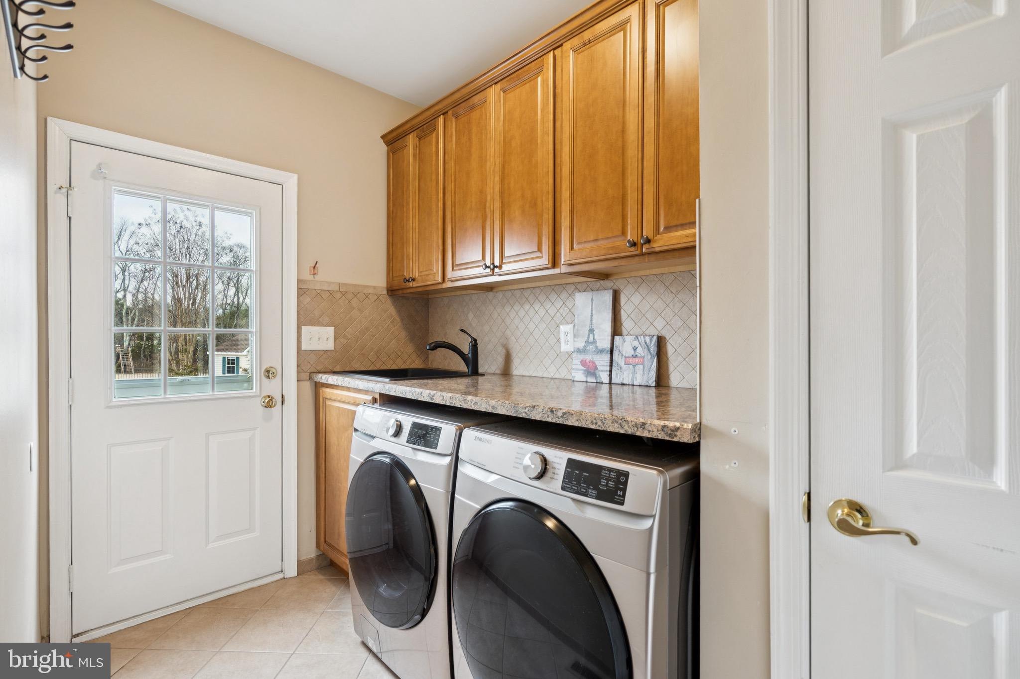 253 Jennings Way Mickleton, NJ 08056 - Photo 18 of 62 a utility room with dryer and washer