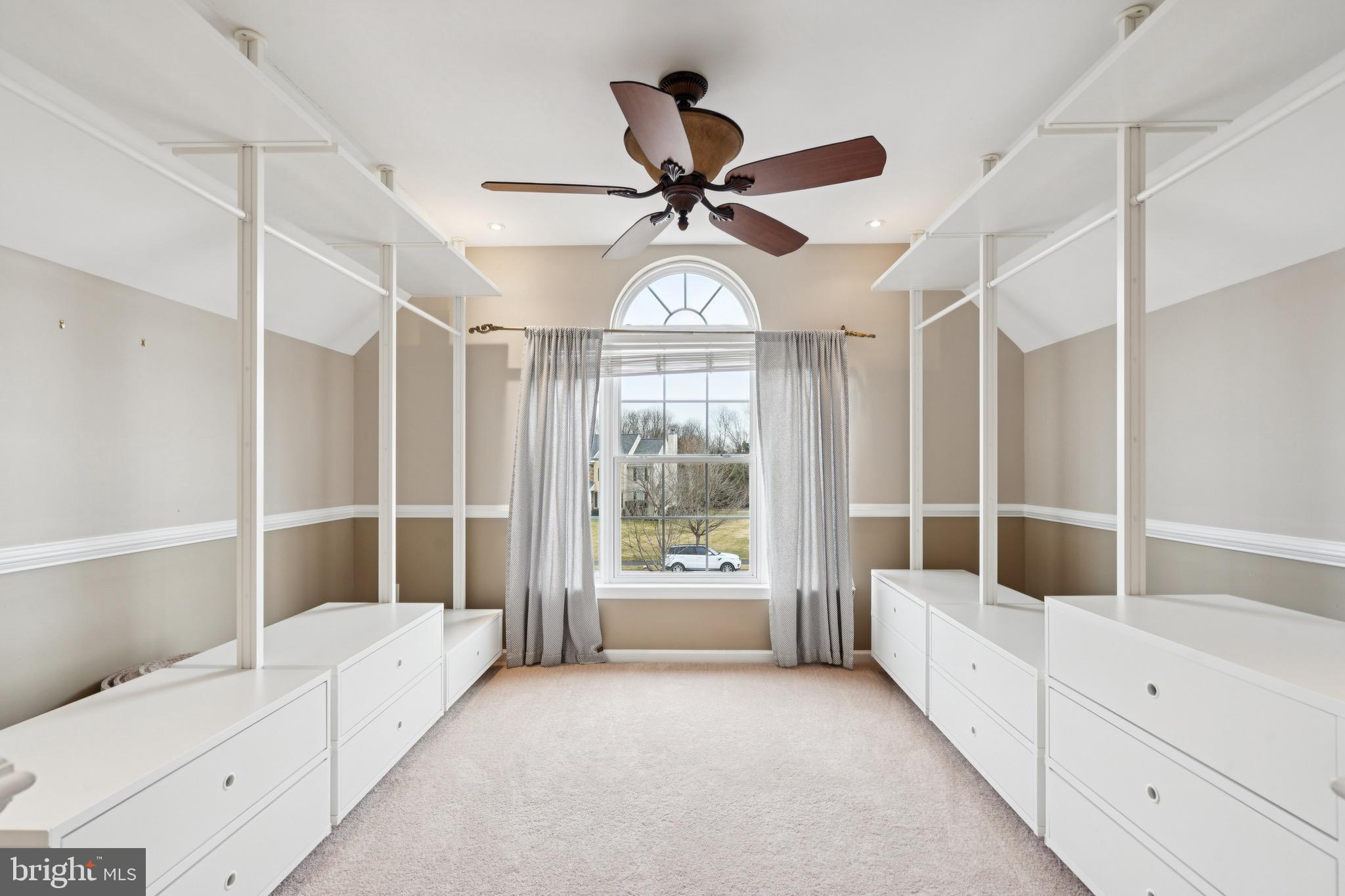 253 Jennings Way Mickleton, NJ 08056 - Photo 22 of 62 a very nice looking room with a large window and chandelier