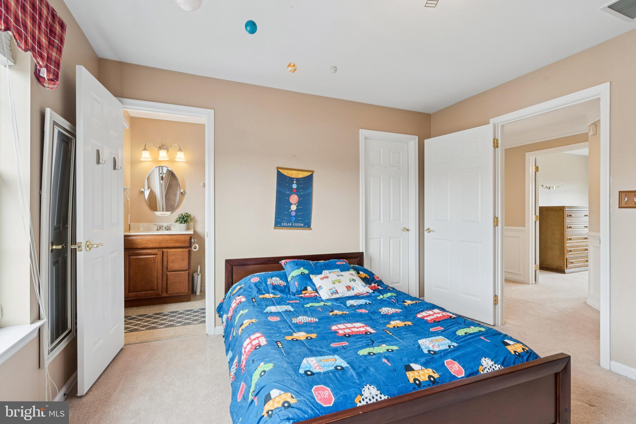 253 Jennings Way Mickleton, NJ 08056 - Photo 29 of 62 a bedroom with a bed and a painting on the wall