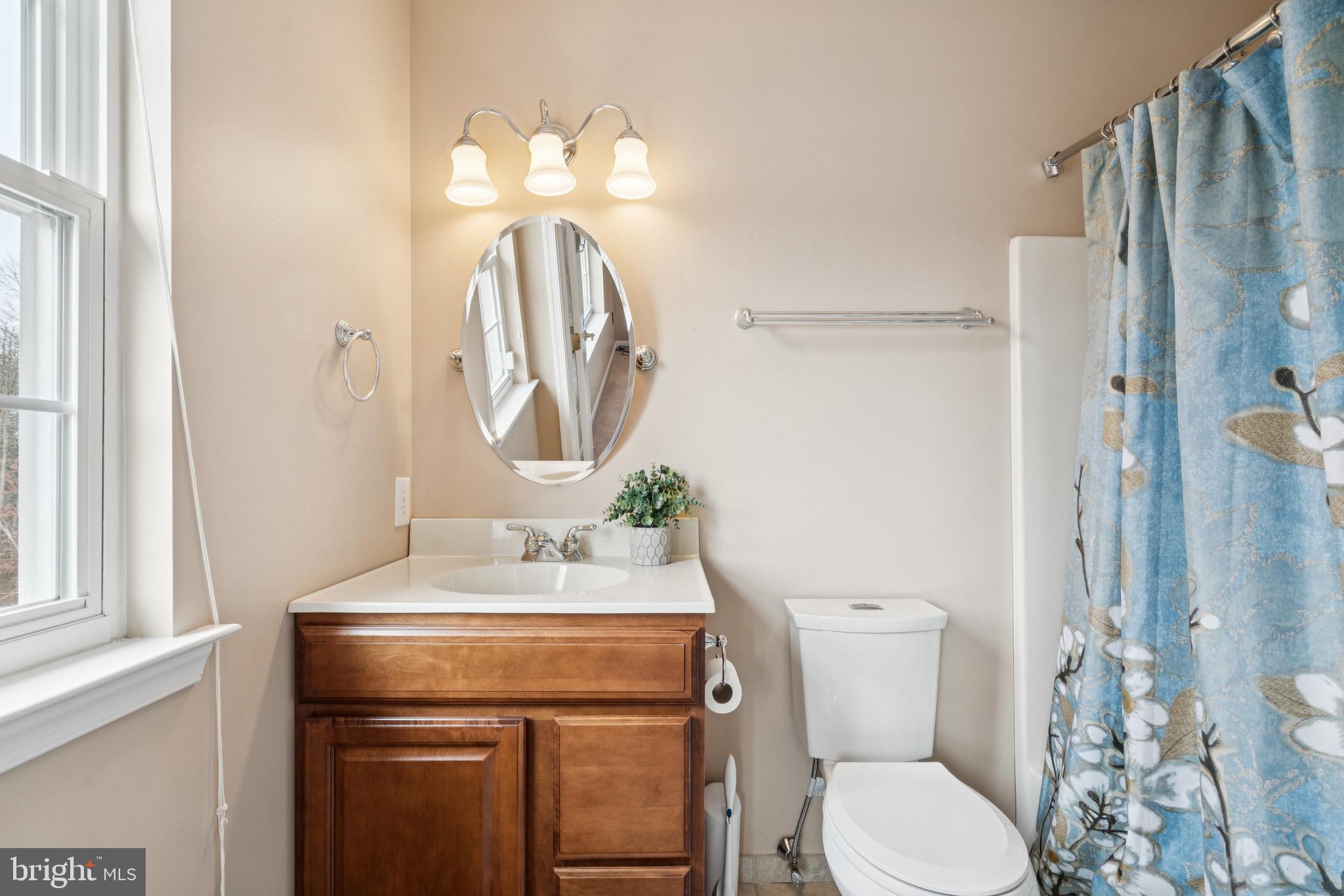 253 Jennings Way Mickleton, NJ 08056 - Photo 30 of 62 a bathroom with a granite countertop toilet sink and mirror