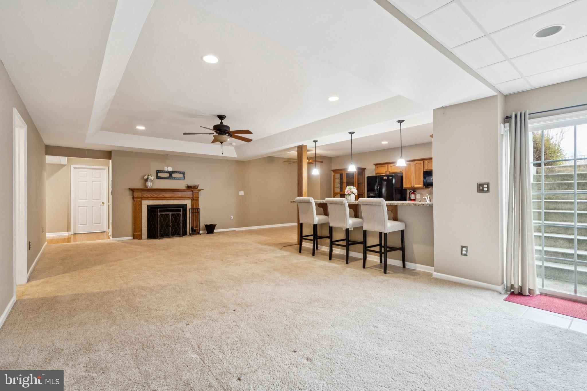 253 Jennings Way Mickleton, NJ 08056 - Photo 38 of 62 a view of a livingroom with furniture and a fireplace