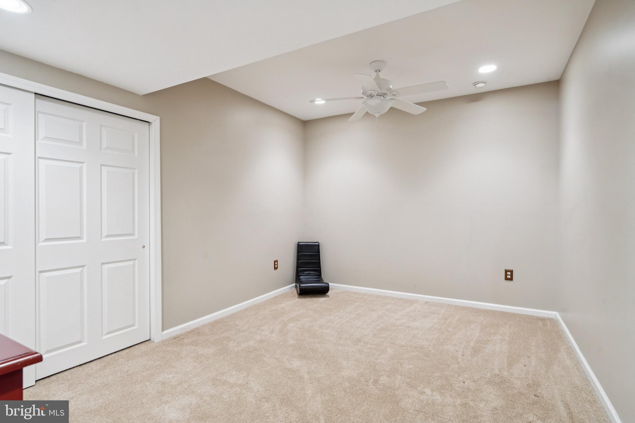 253 Jennings Way Mickleton, NJ 08056 - Photo 42 of 62 an empty room with an entryway and fan