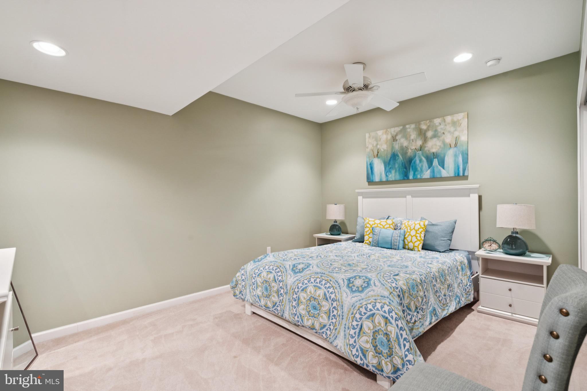 253 Jennings Way Mickleton, NJ 08056 - Photo 45 of 62 a bedroom with a bed and a painting on the wall