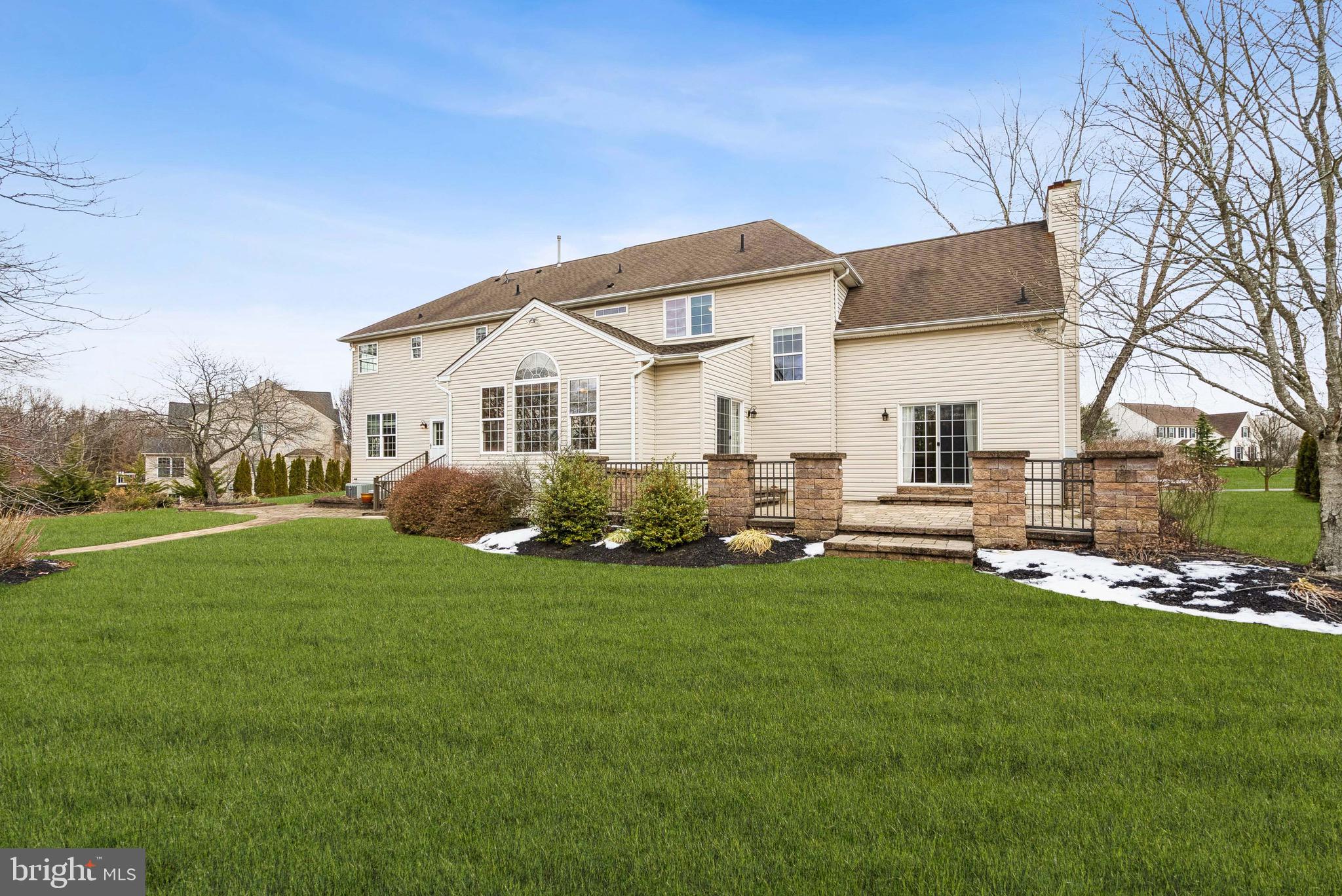 253 Jennings Way Mickleton, NJ 08056 - Photo 54 of 62 a front view of a house with a garden and yard