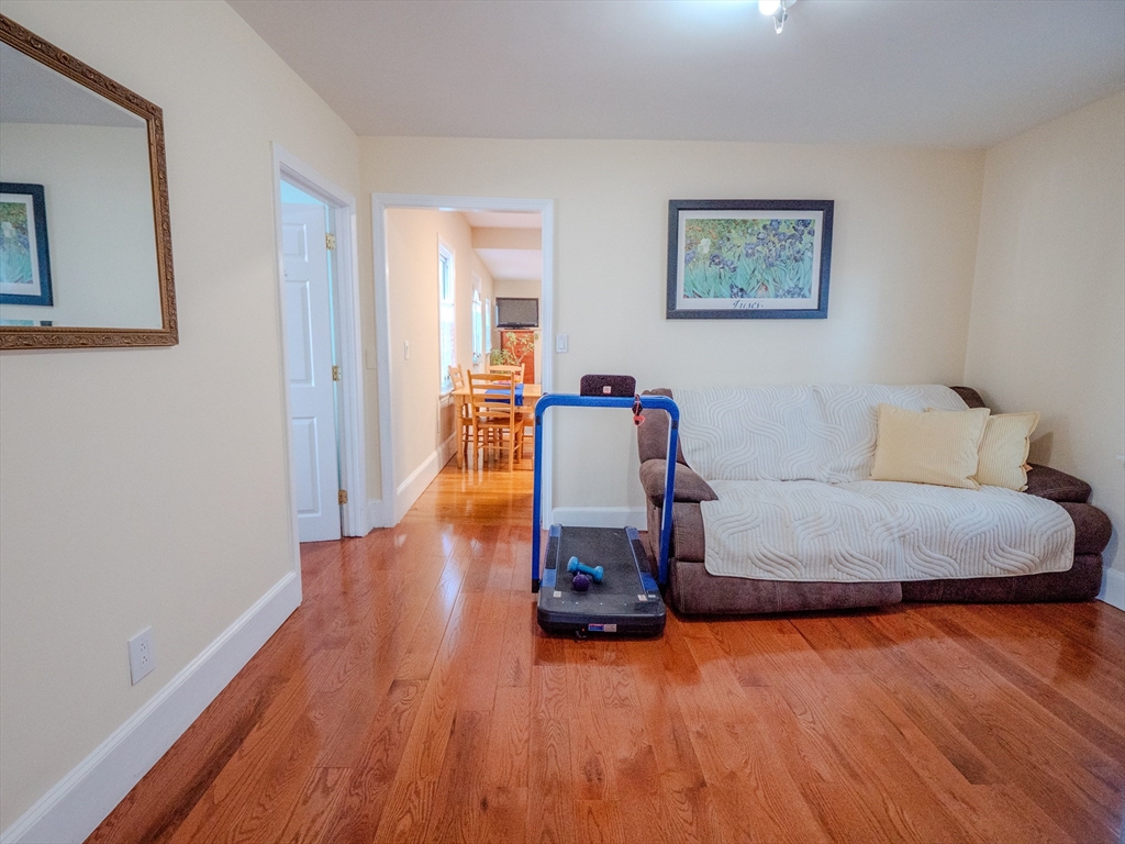 2 Hillside Avenue Somerville, MA 02145 - Photo 11 of 40 a bedroom with furniture and wooden floor