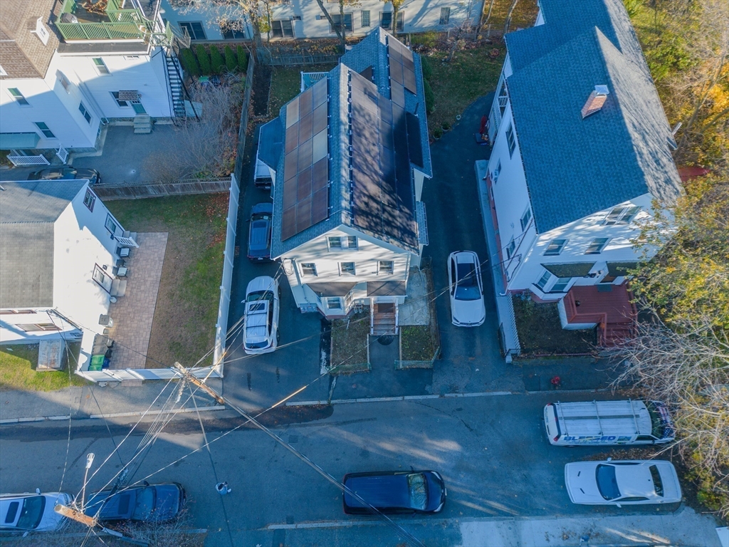 2 Hillside Avenue Somerville, MA 02145 - Photo 10 of 40 an aerial view of a house with table and chairs