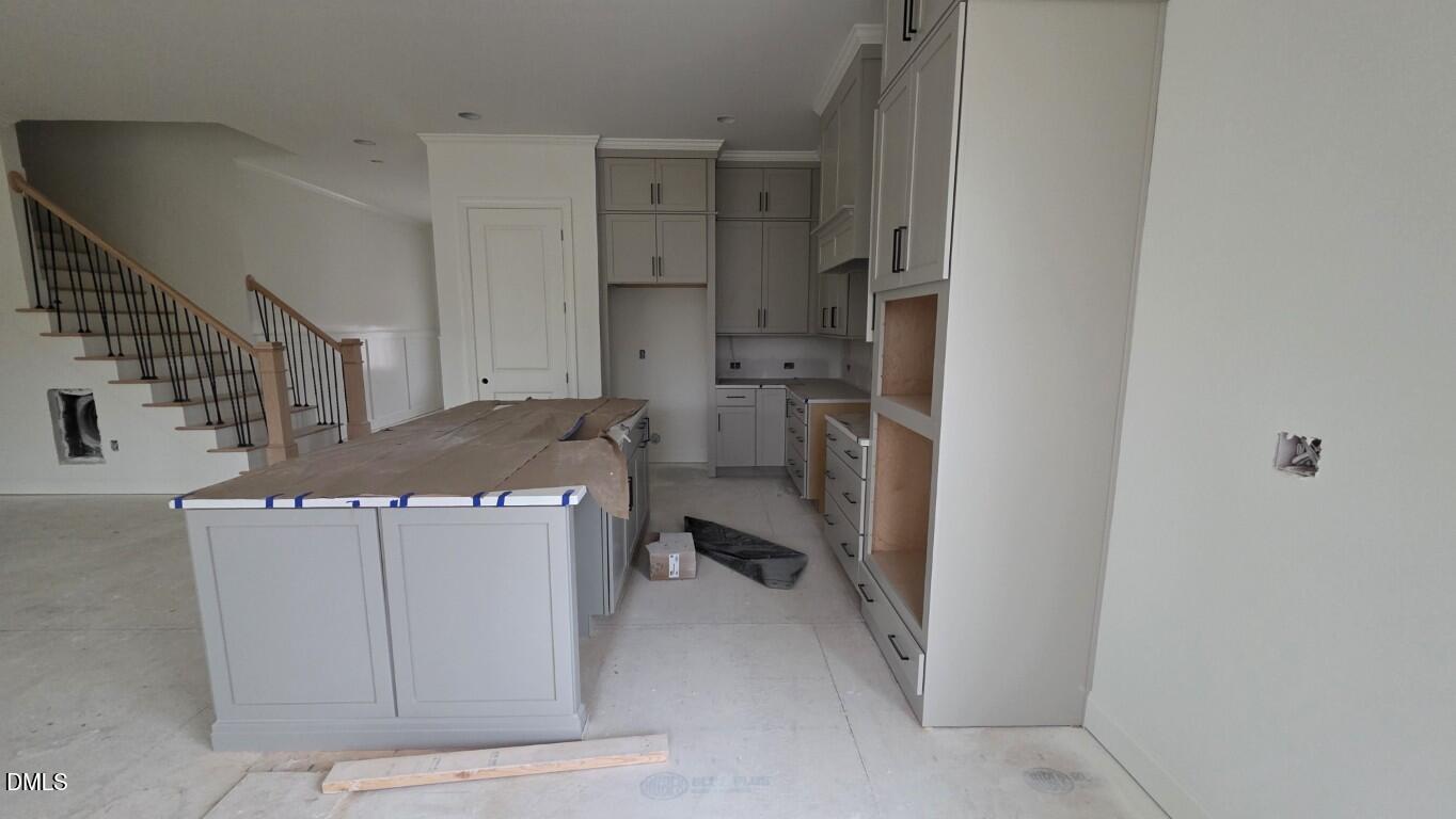 824 Willow Tower Court Rolesville, NC 27571 - Photo 13 of 30 a utility room with cabinets washer and dryer