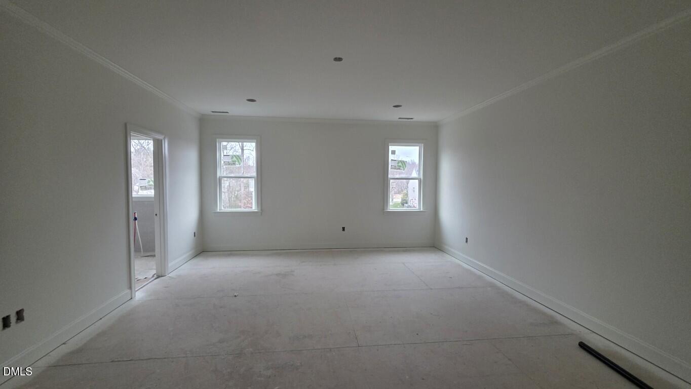824 Willow Tower Court Rolesville, NC 27571 - Photo 18 of 30 a view of empty room with windows