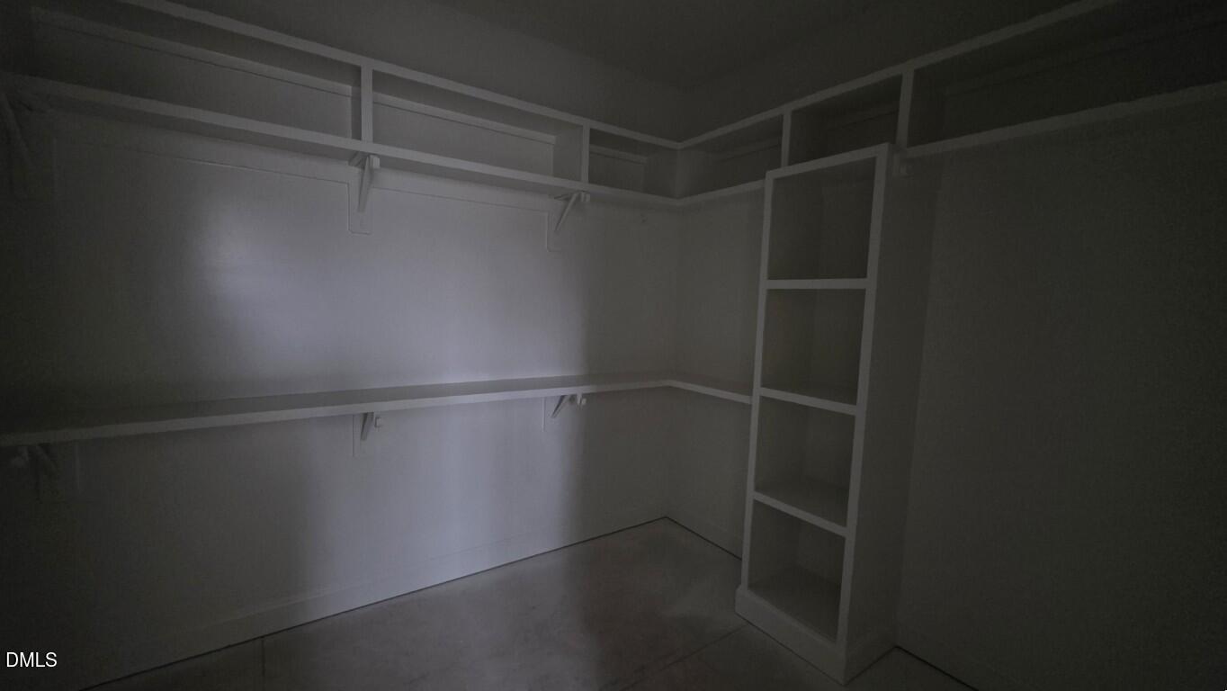 824 Willow Tower Court Rolesville, NC 27571 - Photo 21 of 30 a view of a room with racks on the wall