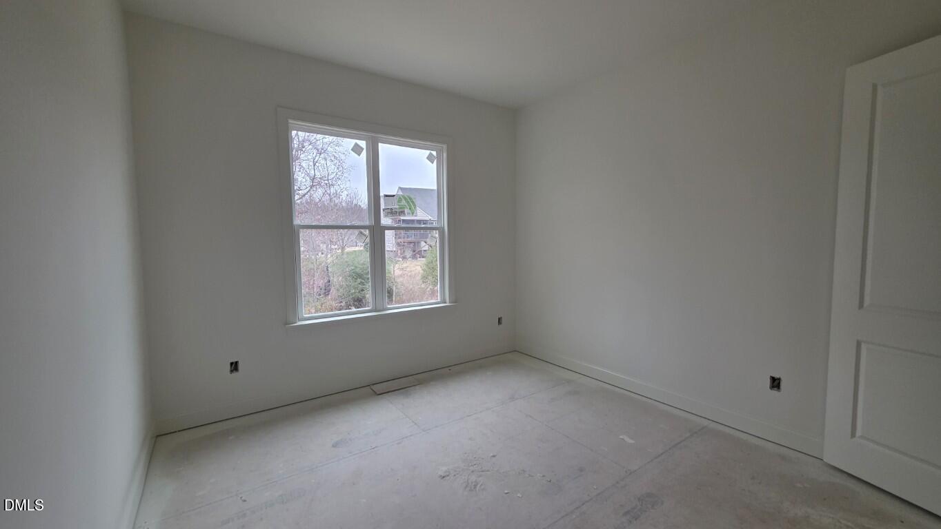 824 Willow Tower Court Rolesville, NC 27571 - Photo 22 of 30 a view of an empty room with a window