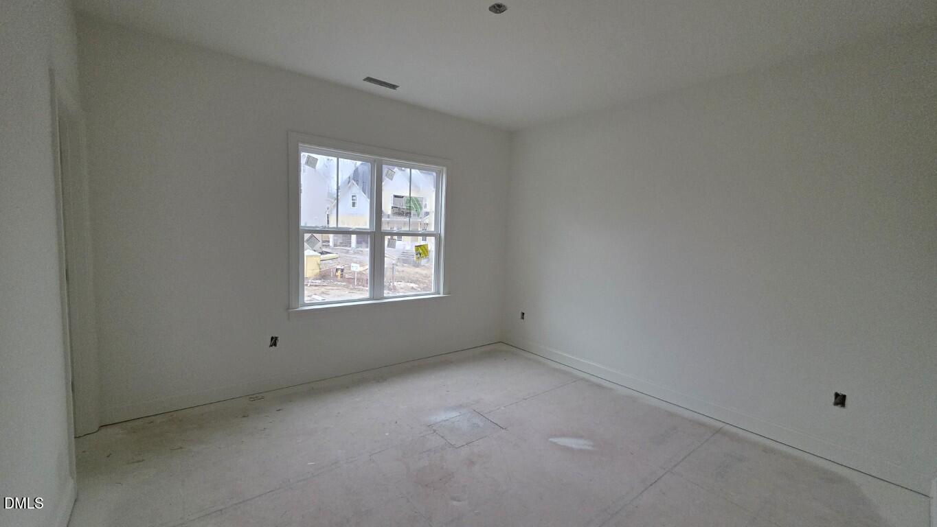 824 Willow Tower Court Rolesville, NC 27571 - Photo 26 of 30 a view of an empty room with a window