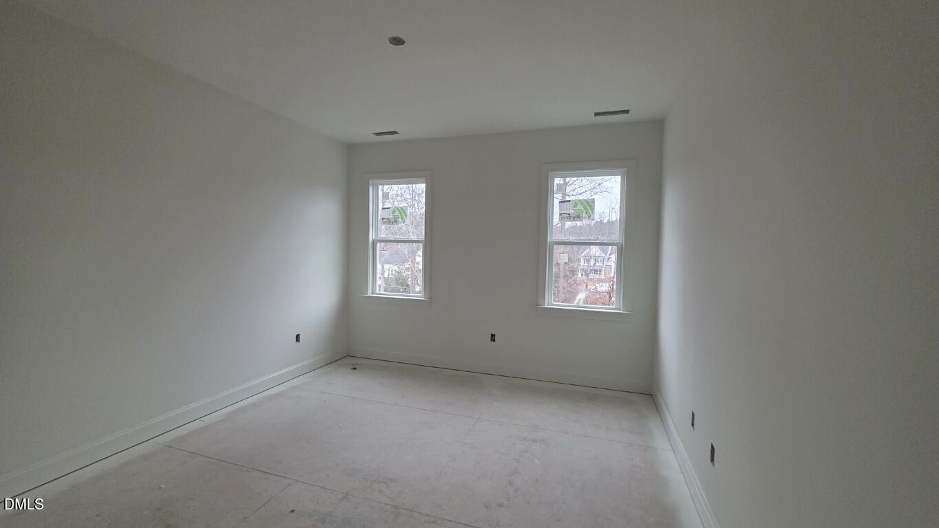 824 Willow Tower Court Rolesville, NC 27571 - Photo 28 of 30 an empty room with windows