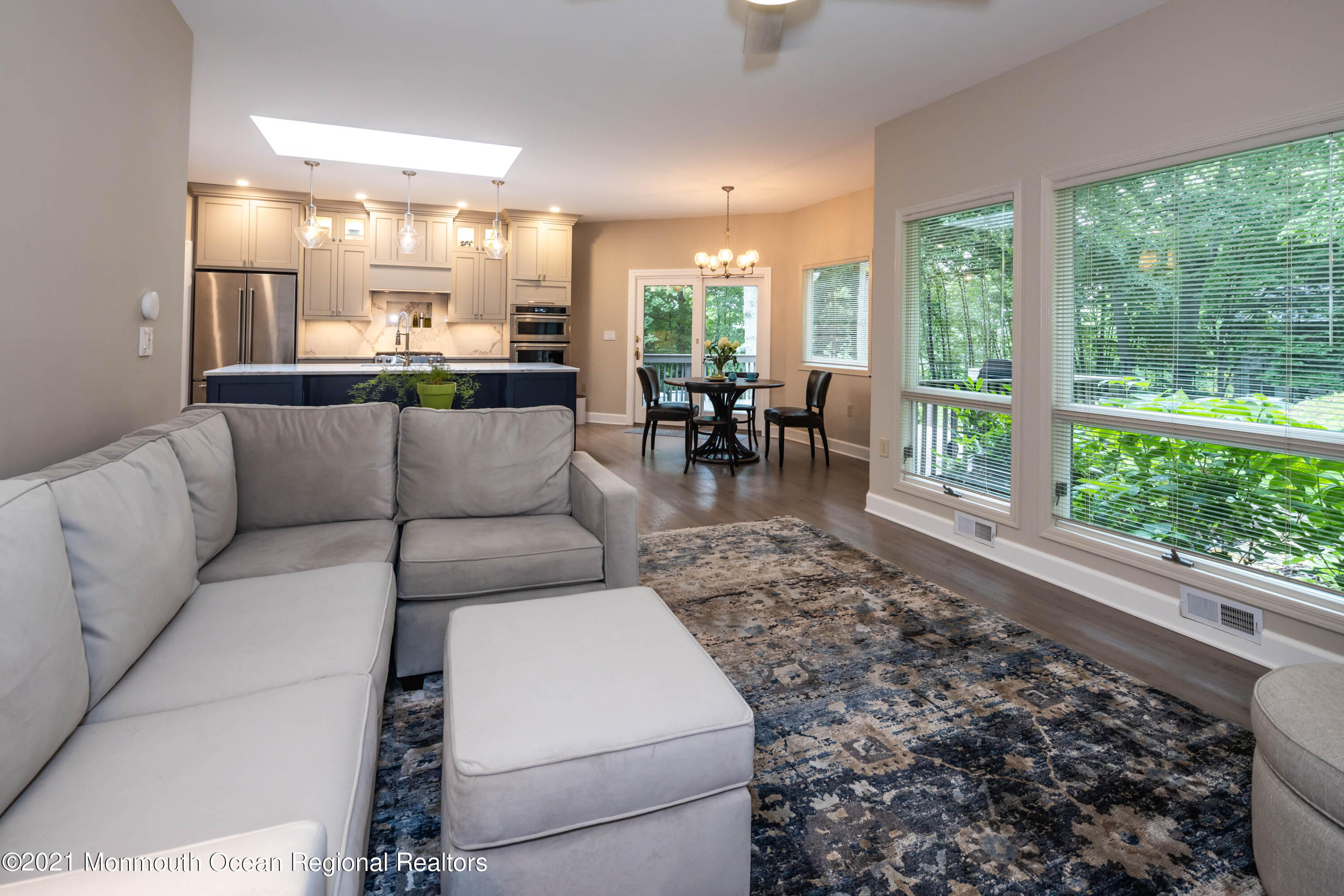 17 Highpoint Road Holmdel, NJ 07733 - Photo 11 of 21 a living room with furniture a large window and chairs