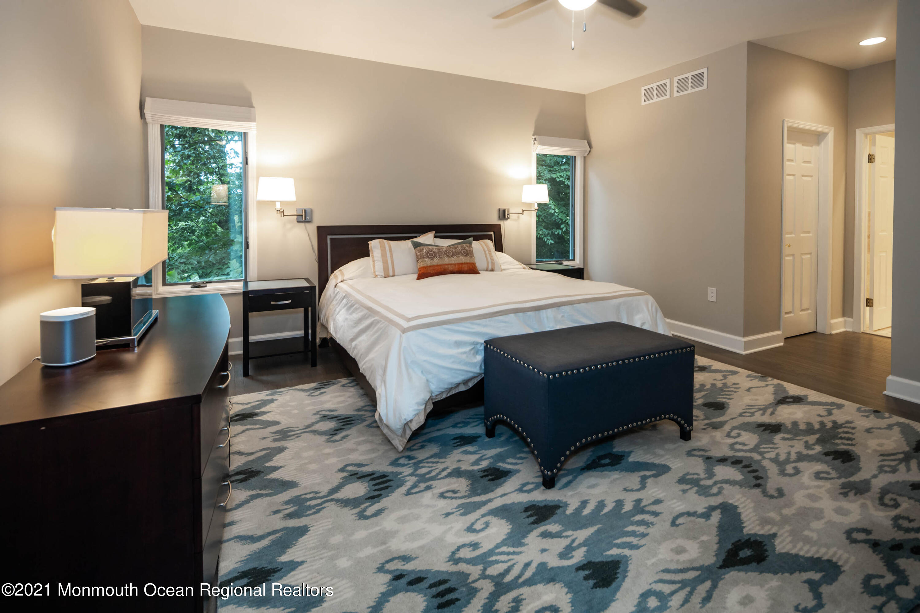 17 Highpoint Road Holmdel, NJ 07733 - Photo 12 of 21 a bedroom with a bed a lamp and a window