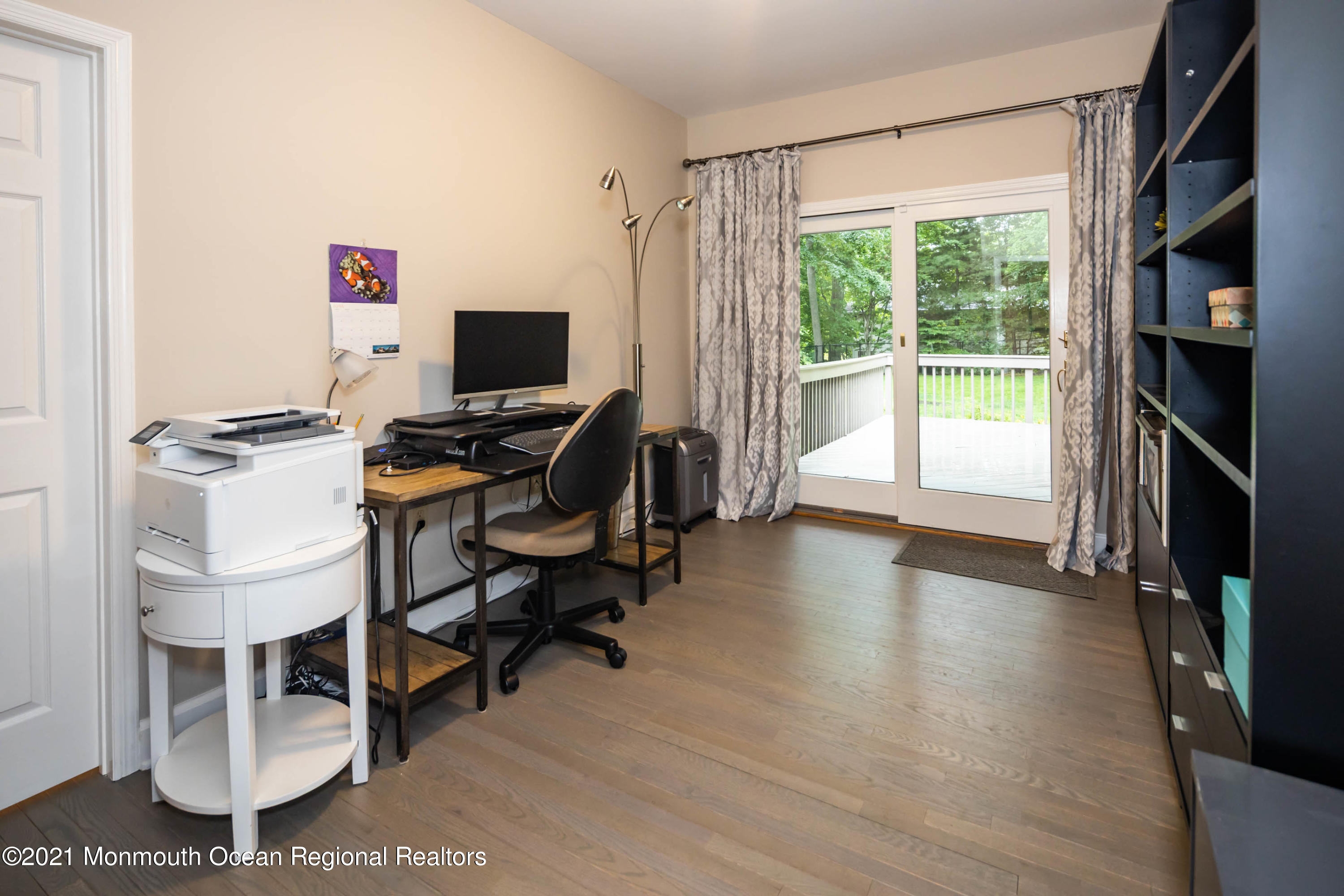 17 Highpoint Road Holmdel, NJ 07733 - Photo 16 of 21 a view of a workspace with furniture and a window