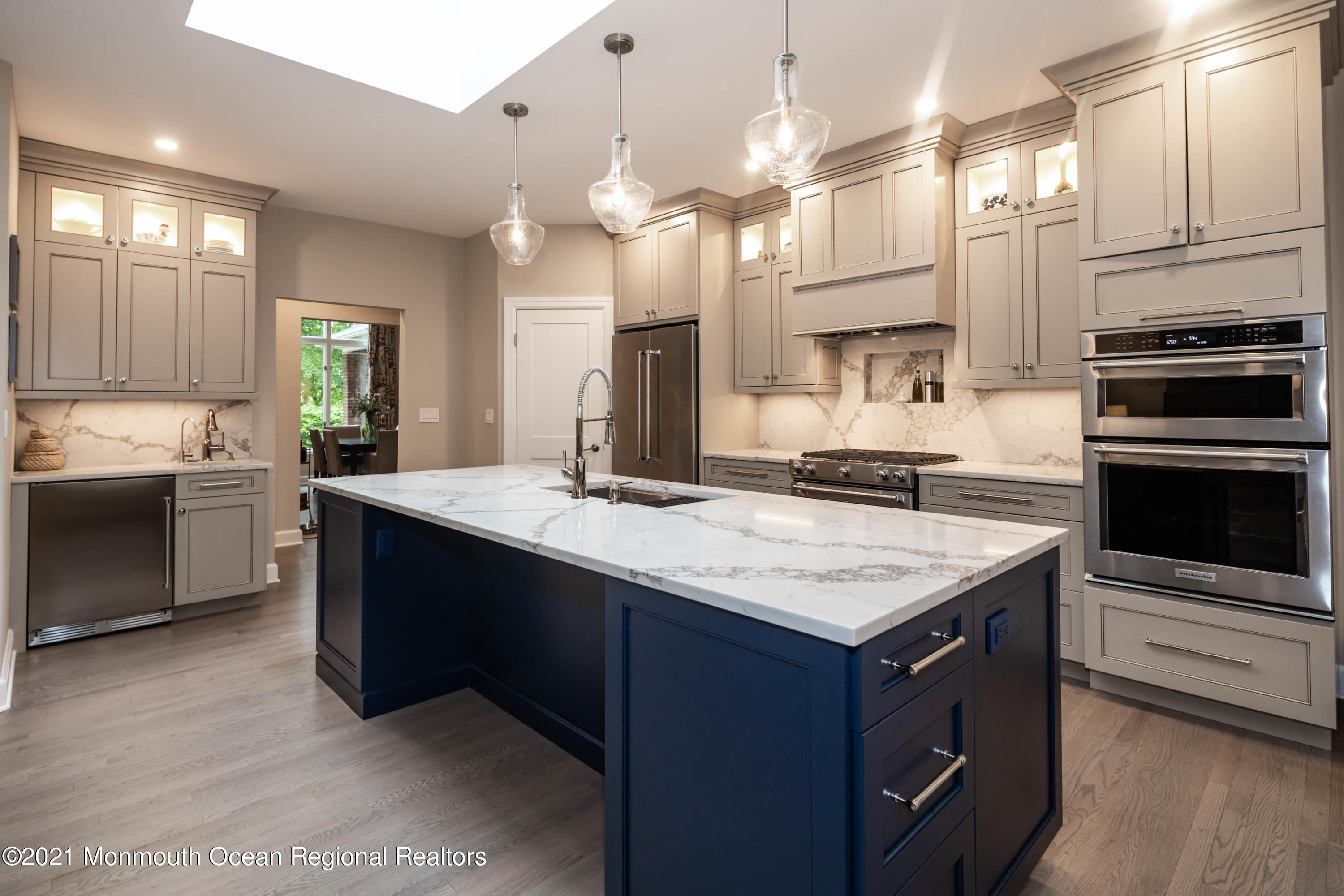 17 Highpoint Road Holmdel, NJ 07733 - Photo 6 of 21 a kitchen with a stove a sink and a refrigerator