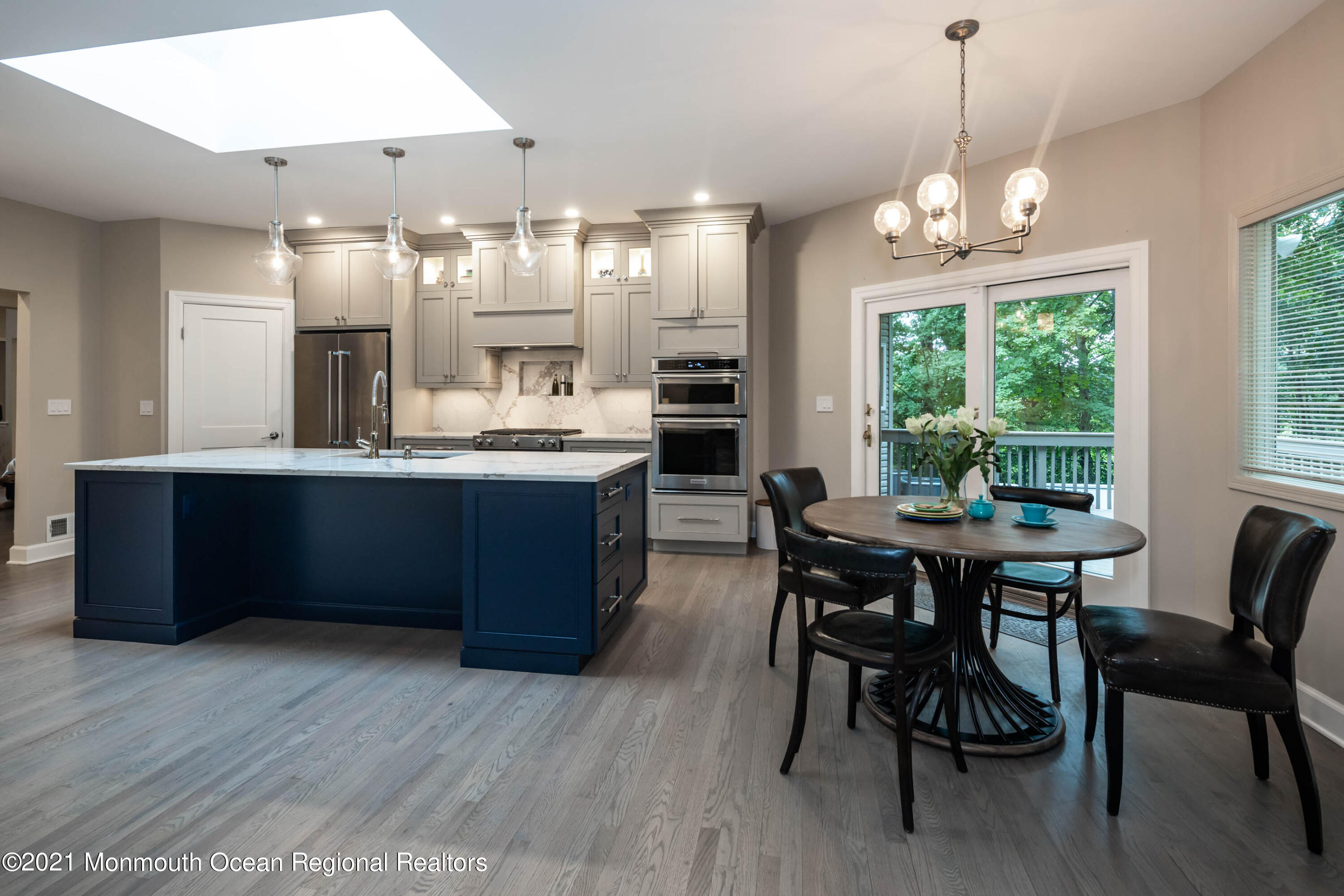 17 Highpoint Road Holmdel, NJ 07733 - Photo 7 of 21 a large kitchen with a table and chairs
