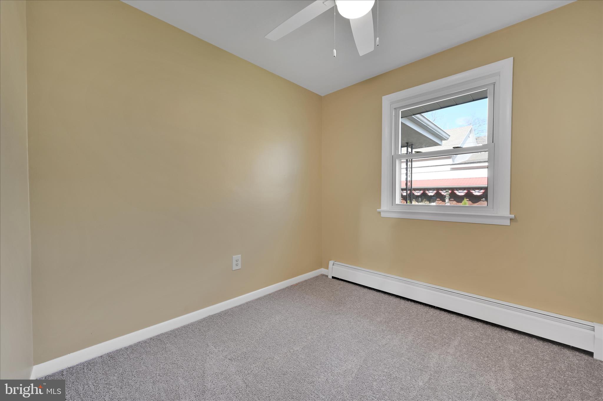 986 Fritztown Road Reading, PA 19608 - Photo 23 of 45 an empty room with a window