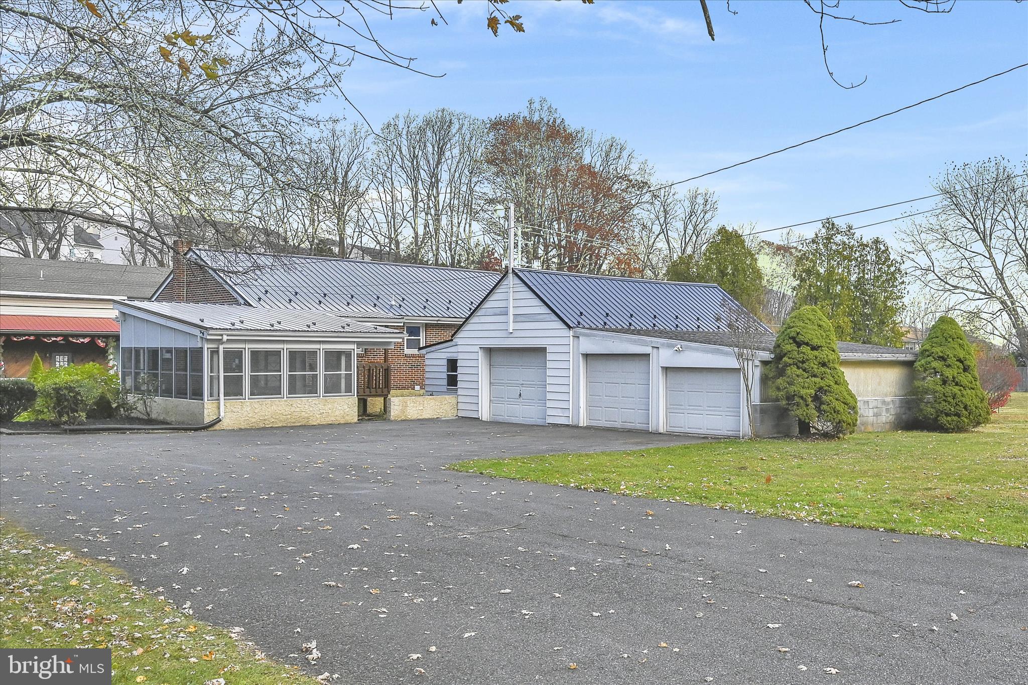 986 Fritztown Road Reading, PA 19608 - Photo 41 of 45 a view of a house with a yard and large tree