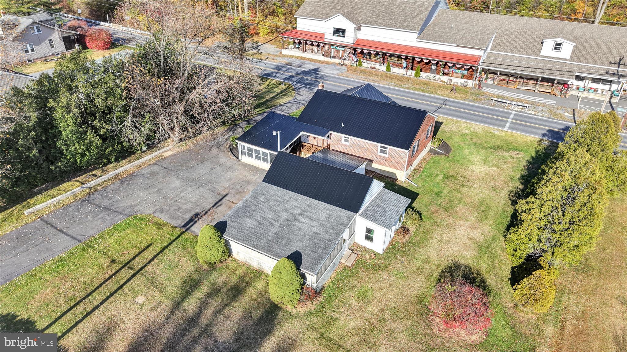 986 Fritztown Road Reading, PA 19608 - Photo 5 of 45 an aerial view of a house with a garden