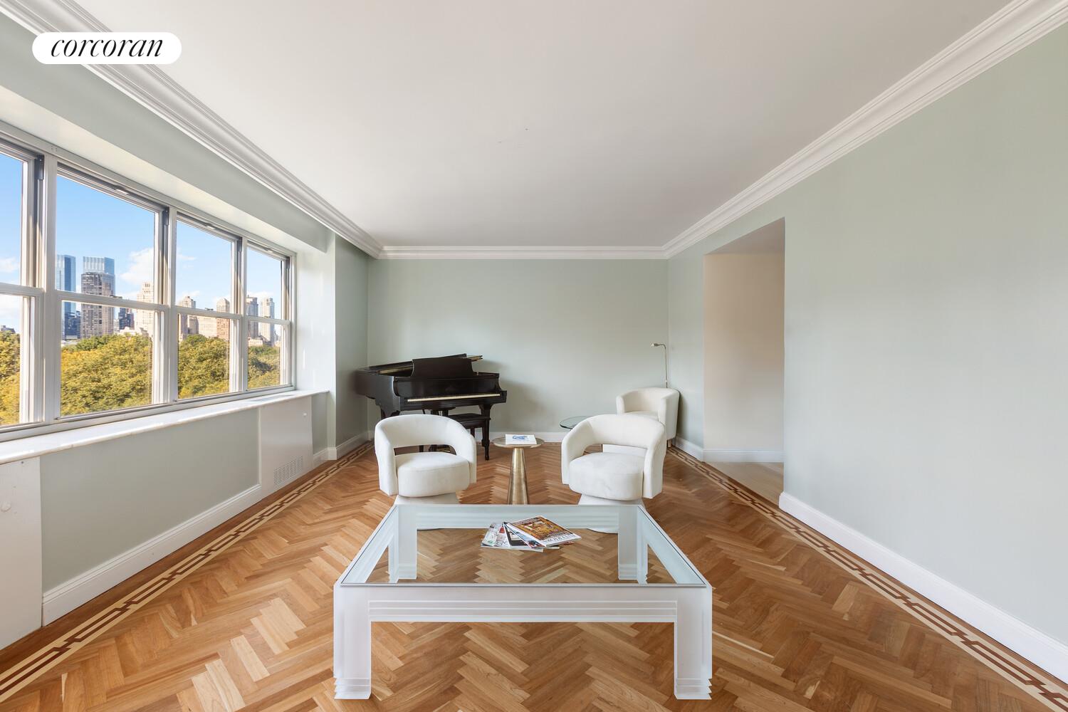 900 5th Avenue, Unit 10C Manhattan, NY 10021 - Photo 3 of 15 a living room with furniture